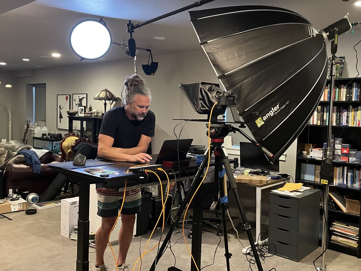 Adrian Lefler studio mid-install with softbox and teleprompter