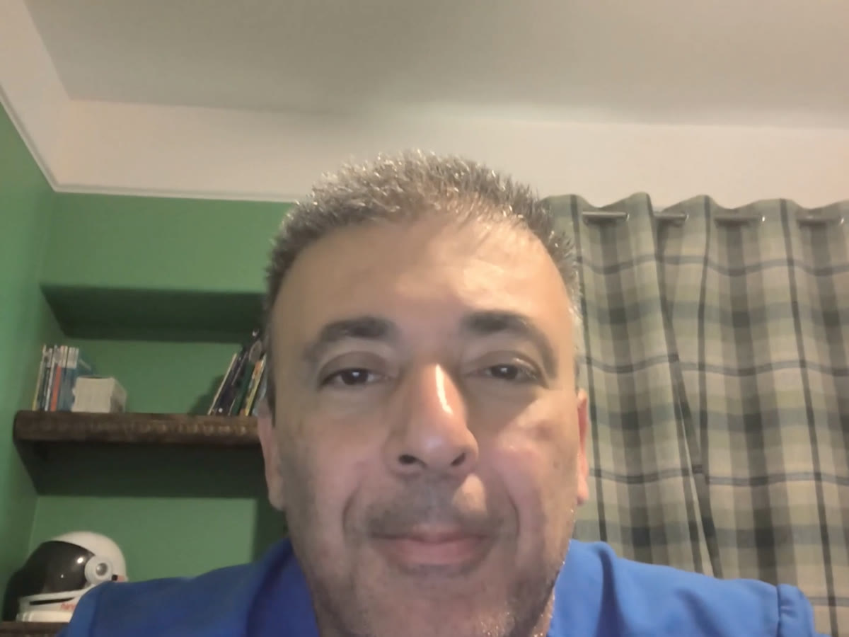 Dr. Kianor Shah on a webcam before his studio build